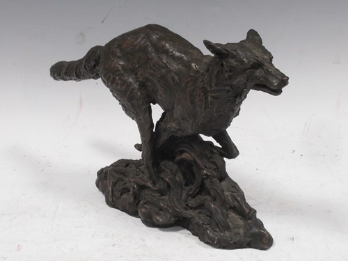 Lot 50 - Bronzed resin model of a fox, 20cm high