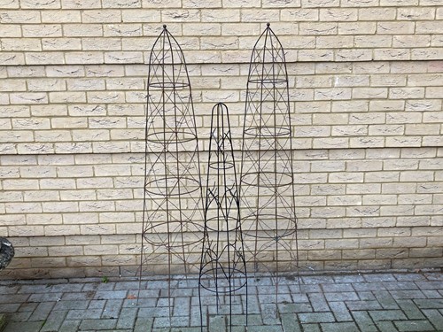Lot 938 - A pair of wirework, 159cm high, and another...
