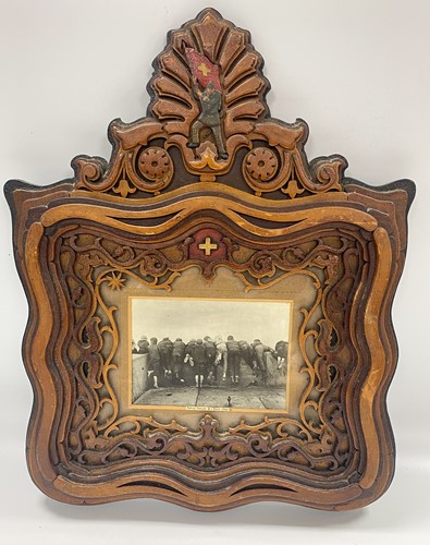 Lot 803 - A continental folk or 'tramp-art' picture frame, circa 1900