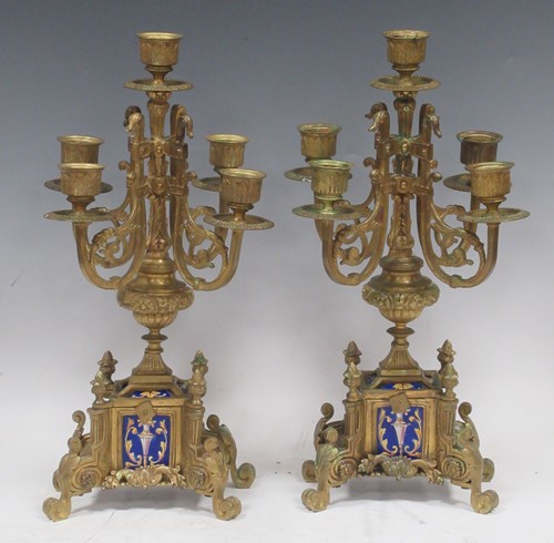 Lot 38 - A pair of Continental gilt brass and ceramic...