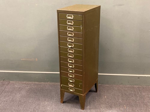 Lot 767 - An industrial green painted office drawer unit,...