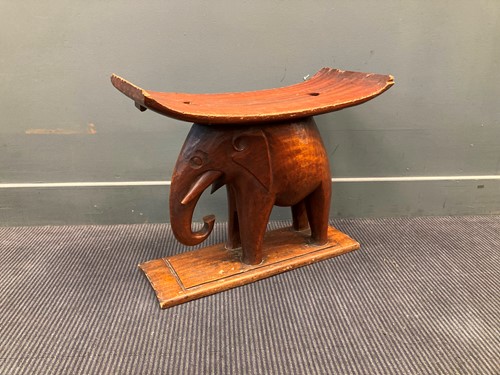 Lot 762 - An African carved elephant stool 49 x 59 x 28cm