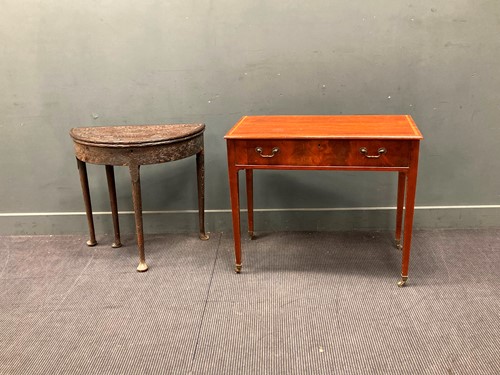 Lot 796 - An 18th century mahogany tea table with later...