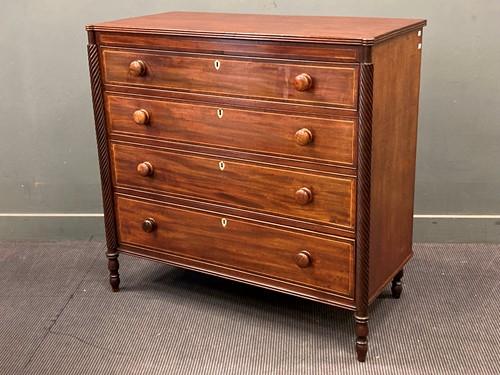 Lot 755 - A 19th century flame mahogany chest of four...