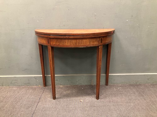 Lot 708 - A George III inlaid mahogany fold over tea...
