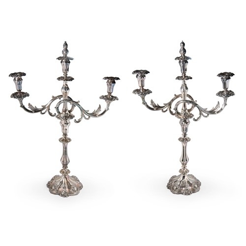 Lot 534 - A pair of silver plated 3 light metamorphic candelabra