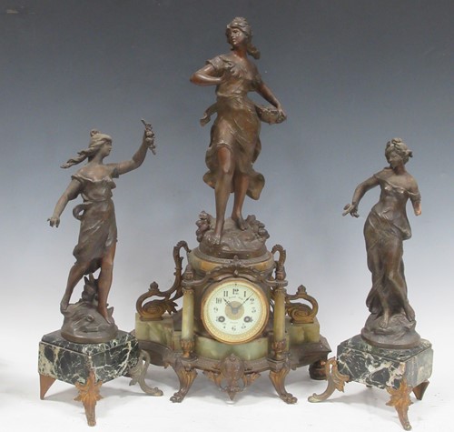 Lot 129 - An early 20th century French spelter and onyx...