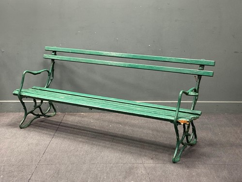 Lot 934 - A Victorian green painted garden bench, the...