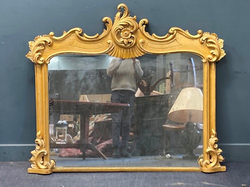 Lot 795 - A Victorian style gilt wood overmantel mirror...