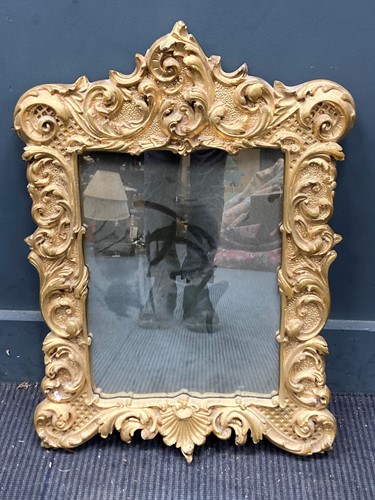 Lot 881 - A Continental rococo style gilt wood wall...