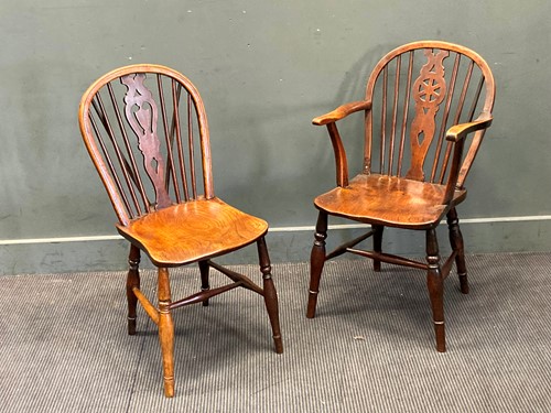 Lot 877 - A 19th century Windsor wheel back beech and...