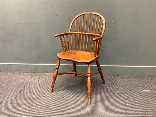 Lot 874 - A stick back windsor armchair, 20th century,...