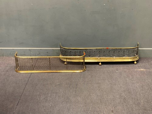 Lot 875 - Two pierced brass fenders 23 x 97 x 17cm 27 x...