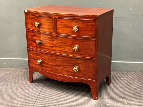 Lot 898 - A 19th century mahogany bow fronted chest of...