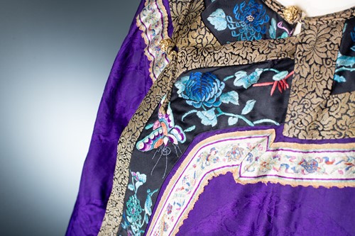 Lot 55 - A Chinese purple silk summer robe, circa 1900