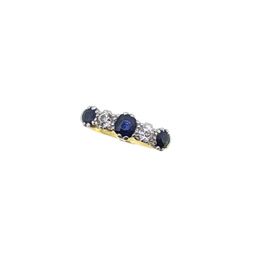 Lot 136 - A five stone sapphire and diamond ring