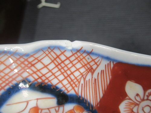 Lot 165 - A pair of Japanese Imari plates; together with...