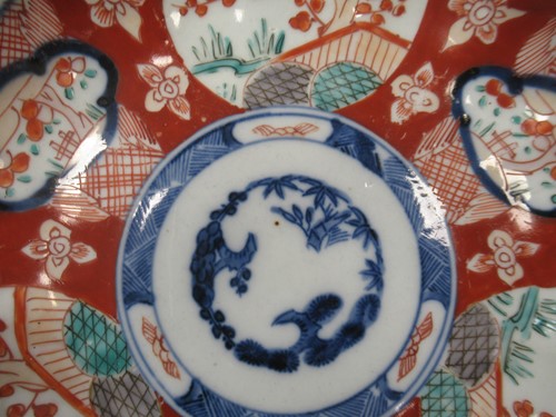 Lot 165 - A pair of Japanese Imari plates; together with...
