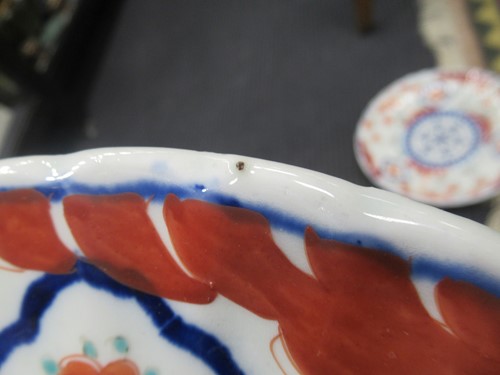 Lot 165 - A pair of Japanese Imari plates; together with...
