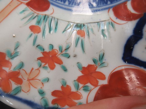Lot 165 - A pair of Japanese Imari plates; together with...