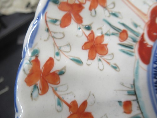 Lot 165 - A pair of Japanese Imari plates; together with...