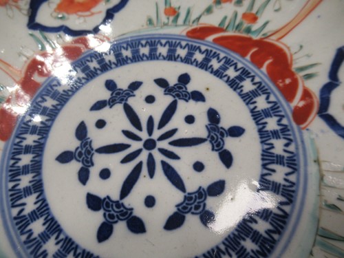 Lot 165 - A pair of Japanese Imari plates; together with...