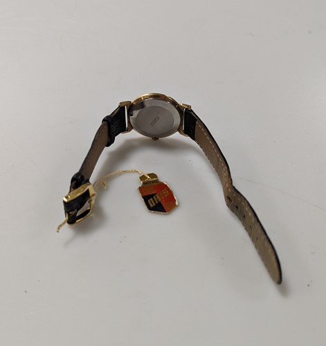 Lot 355 - A gold-plated watch by Oris with the original...