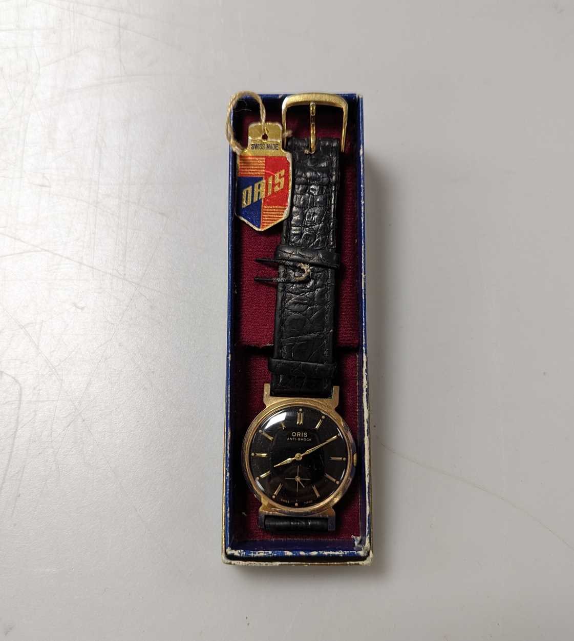 Lot 355 - A gold-plated watch by Oris with the original...