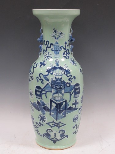 Lot 69 - A Chinese Celedon vase with transfer painted...