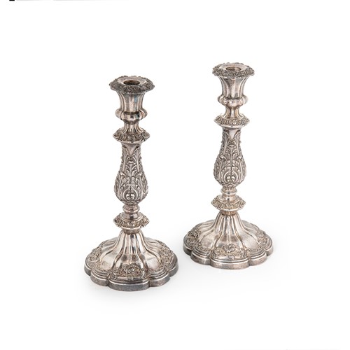 Lot 530 - A pair of silver plated candlesticks