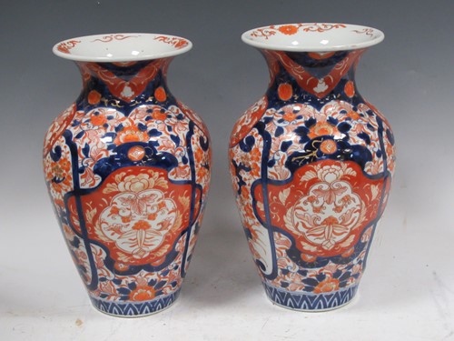 Lot 131 - A pair of imari vases, 30cm high