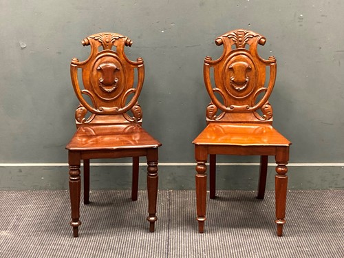 Lot 804 - A near pair of Victorian mahogany hall chairs...