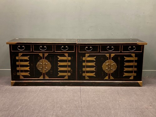 Lot 878 - A Chinese ebonised and gilt metal mounted low...
