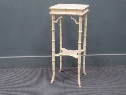 Lot 854 - A faux bamboo white and green painted...