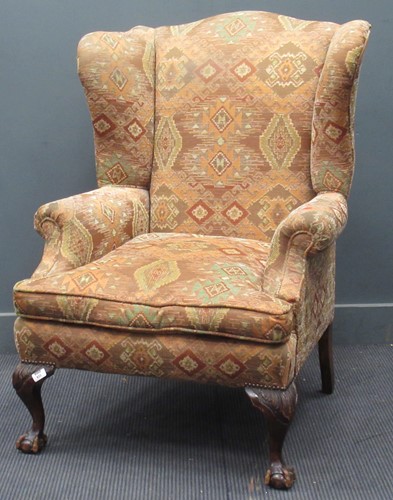 Lot 833 - A George II style mahogany wingback armchair,...
