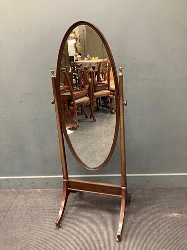 Lot 866 - An Edwardian mahogany cheval mirror, the oval...