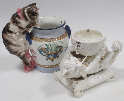 Lot 158 - A Victorian ceramic white glazed cat playing...