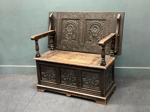Lot 778 - A carved oak monks bench circa 1900, 106cm...