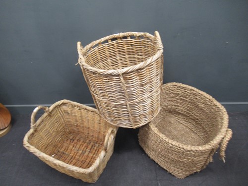 Lot 885 - Two large wicker log baskets; together with a...