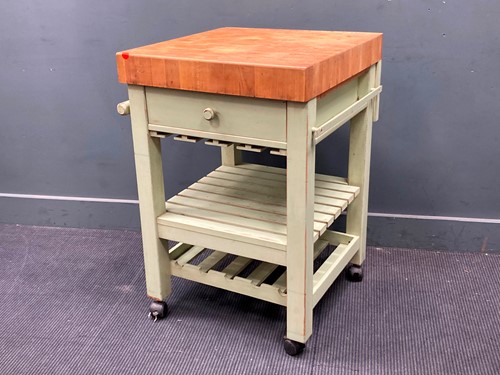 Lot 856 - A modern green-painted butchers block with...