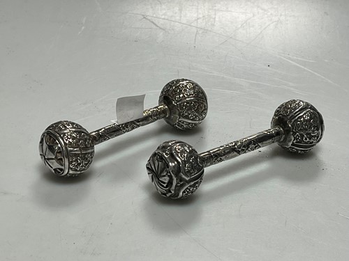 Lot 328 - A pair of continental metalwares dumbbell...