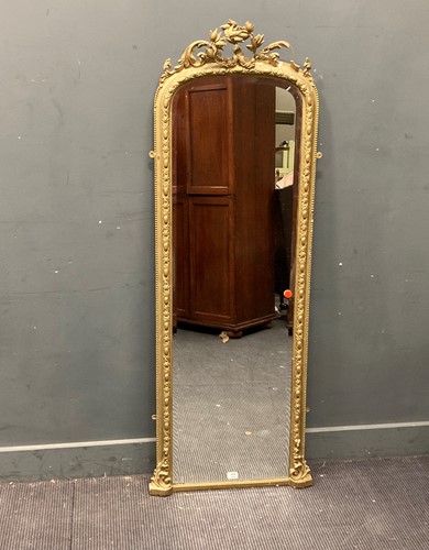 Lot 918 - A late Victorian gilt painted wall mirror of...