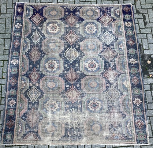 Lot 950 - A blue and green ground kilim type rug, with...
