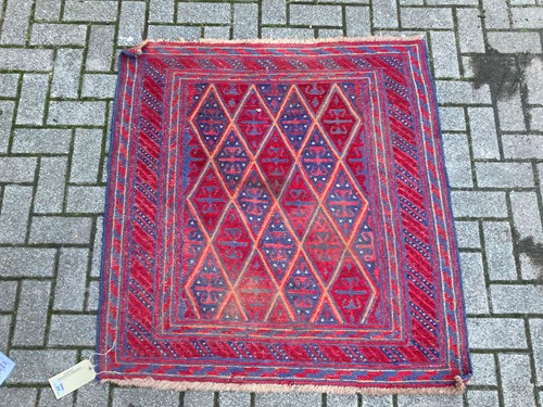 Lot 952 - A Persian blue ground rug, with repeating...