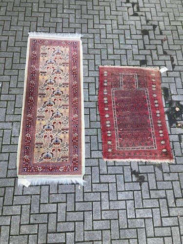 Lot 953 - A yellow ground runner with floral decoration,...