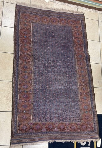 Lot 967 - A blue ground sumac rug, with reg ground...