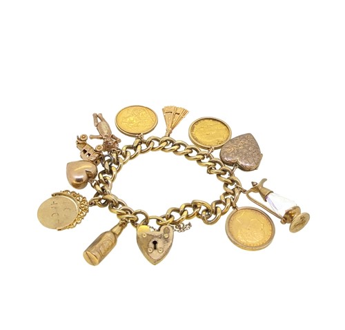 Lot 170 - A gold plated charm bracelet with sovereigns