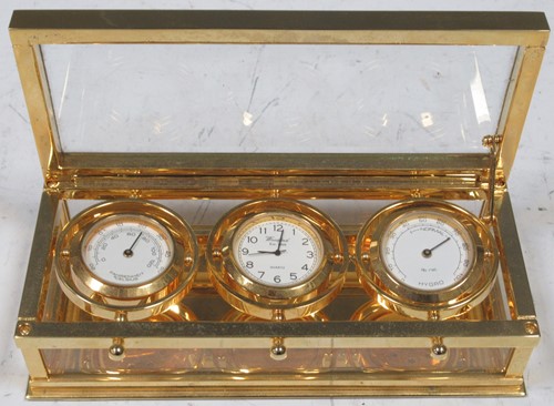 Lot 110 - A Woodford weather station containing a quartz...