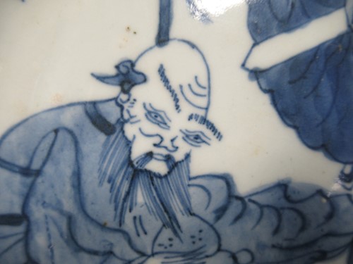 Lot 13 - A Chinese Kangxi-style blue and white shallow...