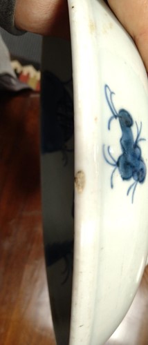 Lot 13 - A Chinese Kangxi-style blue and white shallow...